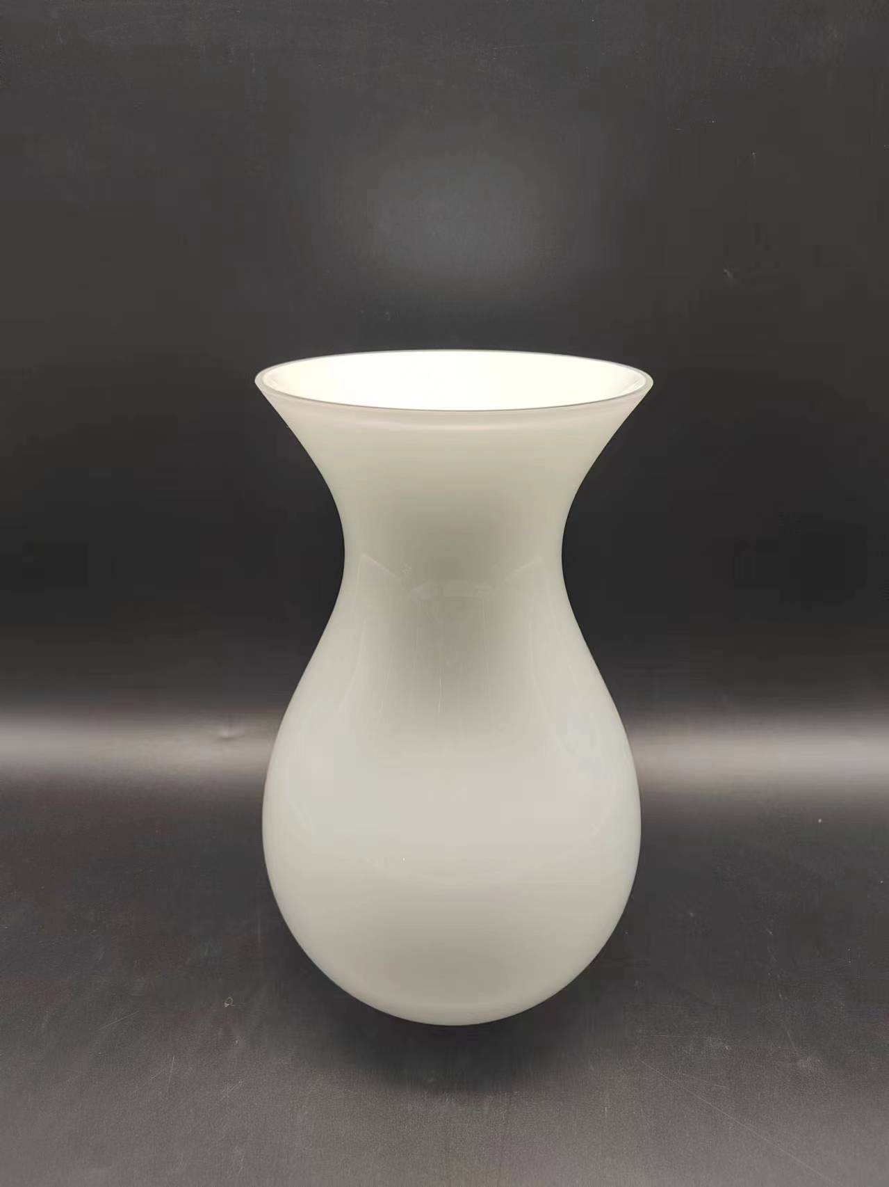 Glass vase in white primary color hand-made